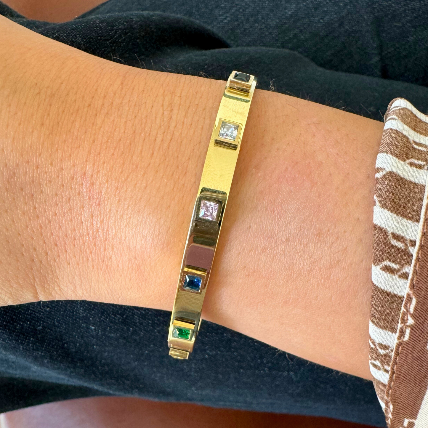 GOLD BANGLE WITH MULTI-COLOR STONES